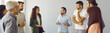© Studio Romantic - Banner with group of serious people meeting and talking in modern office. Business coach training team of men and women, discussing problems, providing expert guidance and helping find better solution