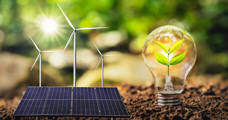 Wall Mural - concept clean energy and saving power in nature. solar panel with wind turbine. small tree and light