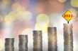 © smshoot - New year 2023 ladder to business success concept and opportunity earning money growth idea. 2023 written on sign on stack of coins with reflection on abstract background