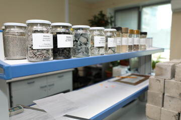 modern laboratory for testing road samples and materials concept. samples of bulk inert materials on