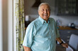 © pikselstock - Portrait of a senior man standing in his home