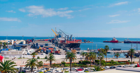 Container ship in Sousse,Tunisia port. View of business logistic import and export freight transportation by container ship. Container loading cargo freight ship. Water transport International.