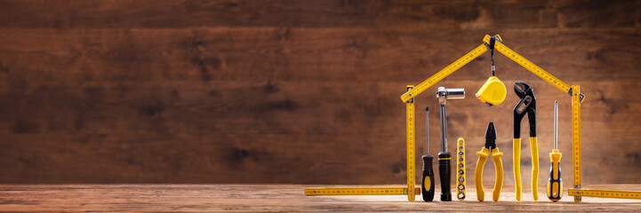 House Made Up Of Measuring Tape Over Tools