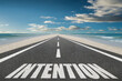 © Jay Koppelman - Intention word on highway for motivation concept.