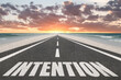 © Jay Koppelman - Intention word on highway for motivation concept.