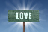 Love sign on blue sky background.