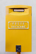 © Simone Anne/Stocksy - Yellow Vatican post office box