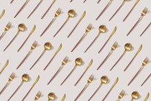 Seamless Pattern Of Fancy Golden Cutlery