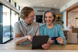 © McKinsey Jordan/Stocksy - Couple Laughs While Shopping Online