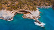 © Yakov Knyazev/Stocksy - azure water surrounding a cave in turkey