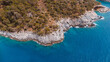 © Yakov Knyazev/Stocksy - azure water surrounding a cape in turkey