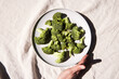 © Anna Tabakova/Stocksy - Plate with broccoli