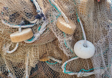 Close Up Photo With Fishing Net And Floats