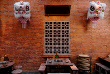 Chinese Traditional Lion Head, Hanging On The Outdoor Wall 