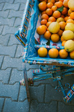 Bright Cart With Fresh Oranges