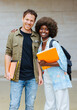 © VICTOR TORRES/Stocksy - Cheerful couple at university