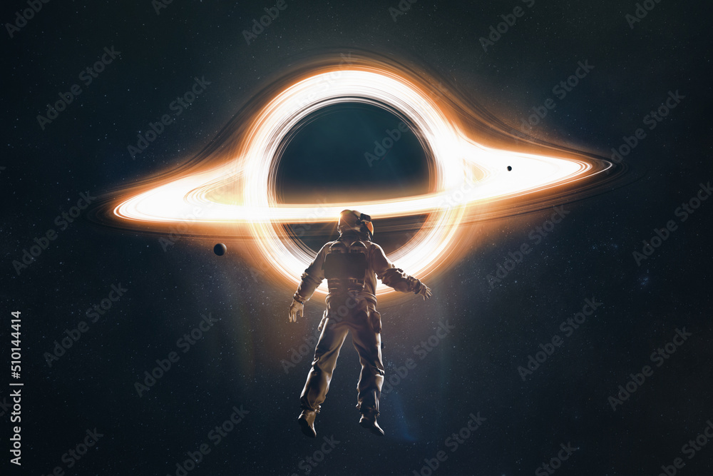 Astronaut in front of a black hole in the universe Stock Photo | Adobe ...