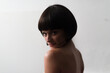 © Ibai Acevedo/Stocksy - Seductive beautiful woman looking at camera