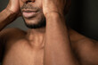 © Hernandez & Sorokina/Stocksy - Close Up Of Black Man Face