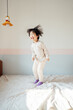 © ZQZ Studio/Stocksy - Little Asian girl at home