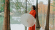 © Pansfun Images/Stocksy - Portrait of Asian woman in red traditional Chinese Hanfu
