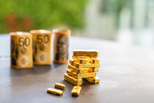 Gold Bullion Bars And Fiat Currency
