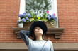 © Lauren Lee/Stocksy - Woman looking up at sky