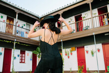 Woman From Behind Dancing In A Colorful Square