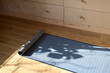 © Di Na/Stocksy - Yoga mat in the sun room