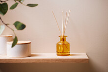 Reed Diffusers And Jars On Shelf