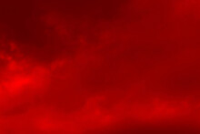 Red Cloud Texture Background. Blurred Photo Of Red Sky With Clouds. Photo Can Be Used For Galaxy Space, New Year, Christmas And All Celebrations Backgrounds.	
