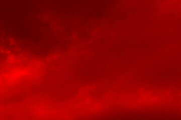 Red cloud texture background. Blurred photo of red sky with clouds. Photo can be used for galaxy space, New Year, Christmas and all celebrations backgrounds.	
