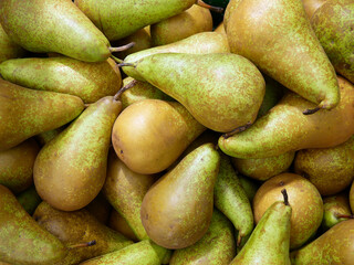 Fresh juicy pears Conference at the market on a summer day. Organic food from Polish. 