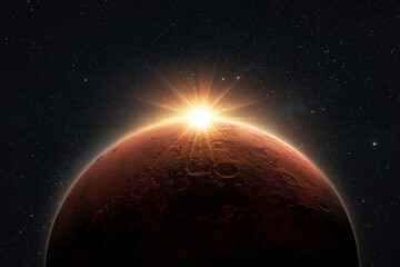 Amazing red planet Mars with sunrise rays in deep starry space. Space Wallpaper