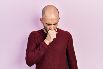 Sticker - Young bald man wearing casual clothes feeling unwell and coughing as symptom for cold or bronchitis. health care concept.