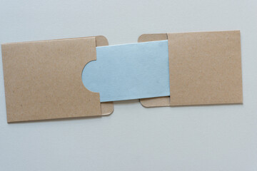 two envelopes with blue paper link