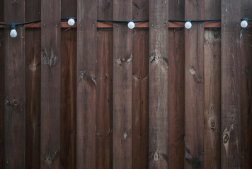 Wall Mural - Old plank wooden wall background. The texture of old wood. Weathered piece of wood.