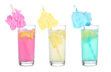 Cold, Colorful Cotton Candy Lemonade Summer Drinks. Three Colors In Tall Glasses Isolated On A White Background.