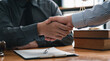 © crizzystudio - Lawyers shake hands with business people to seal a deal with partner lawyers. or a lawyer discussing contract agreements, handshake concepts, agreements, agreements