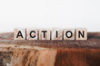 Action Word Written In Wooden Cube