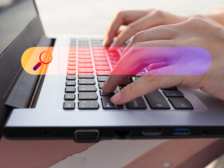 Wall Mural - search technology a woman using a laptop or smartphone to find information, use search console.