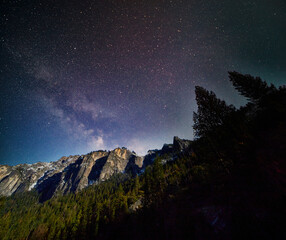 milky way and stars over yosemite park