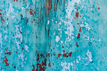 Chipped Blue Paint Surface With Drips On A Wood Panel