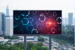 Technology hologram on billboard over panorama city view of Kuala Lumpur. KL is the largest tech hub in Malaysia, Asia. The concept of developing coding and high-tech science.