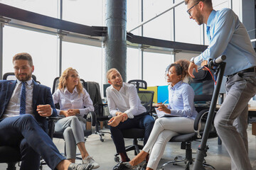 Wall Mural - Group of happy progressive business people working on startup together at creative office