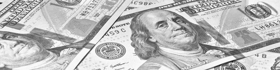 Wall Mural - american paper money. 100 dollar and other us banknotes. black and white light banner or header. sav