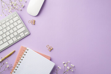 Business concept. Top view photo of workstation keyboard computer mouse notepads gold pen binder clips and white gypsophila flowers on isolated lilac background with empty space