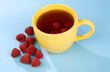 raspberry tea in a yellow cup
