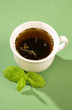 hot tea with mint on a blue background