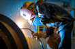© onlyyouqj - The welder is welding steel plates